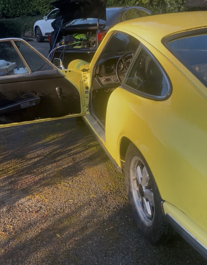 Exterior detail — classic car paint gleaming after hand detailing